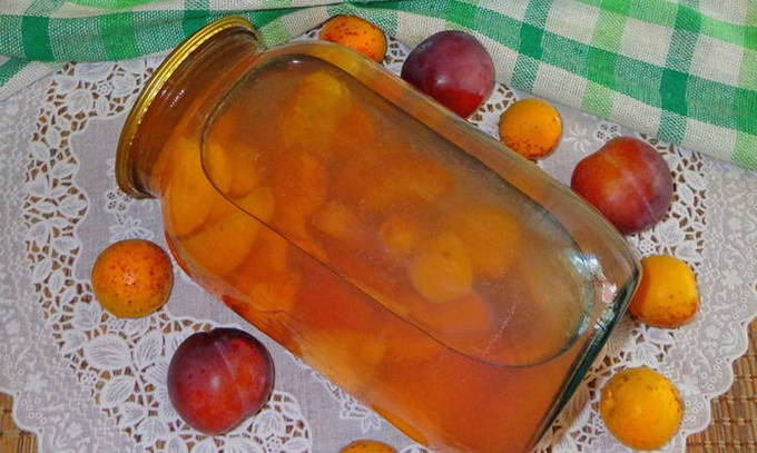 Apricot compote and plums in a 3 liter jar for the winter